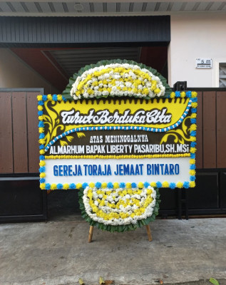 Papan Bunga Duka di Sukoreno